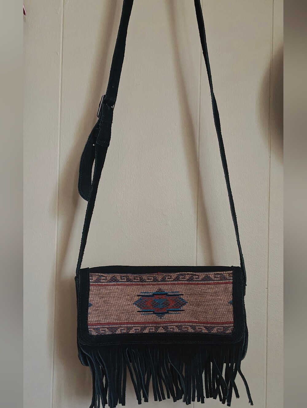 Minnetonka Black Suede Fringe Crossbody Bag with Southwestern Accent